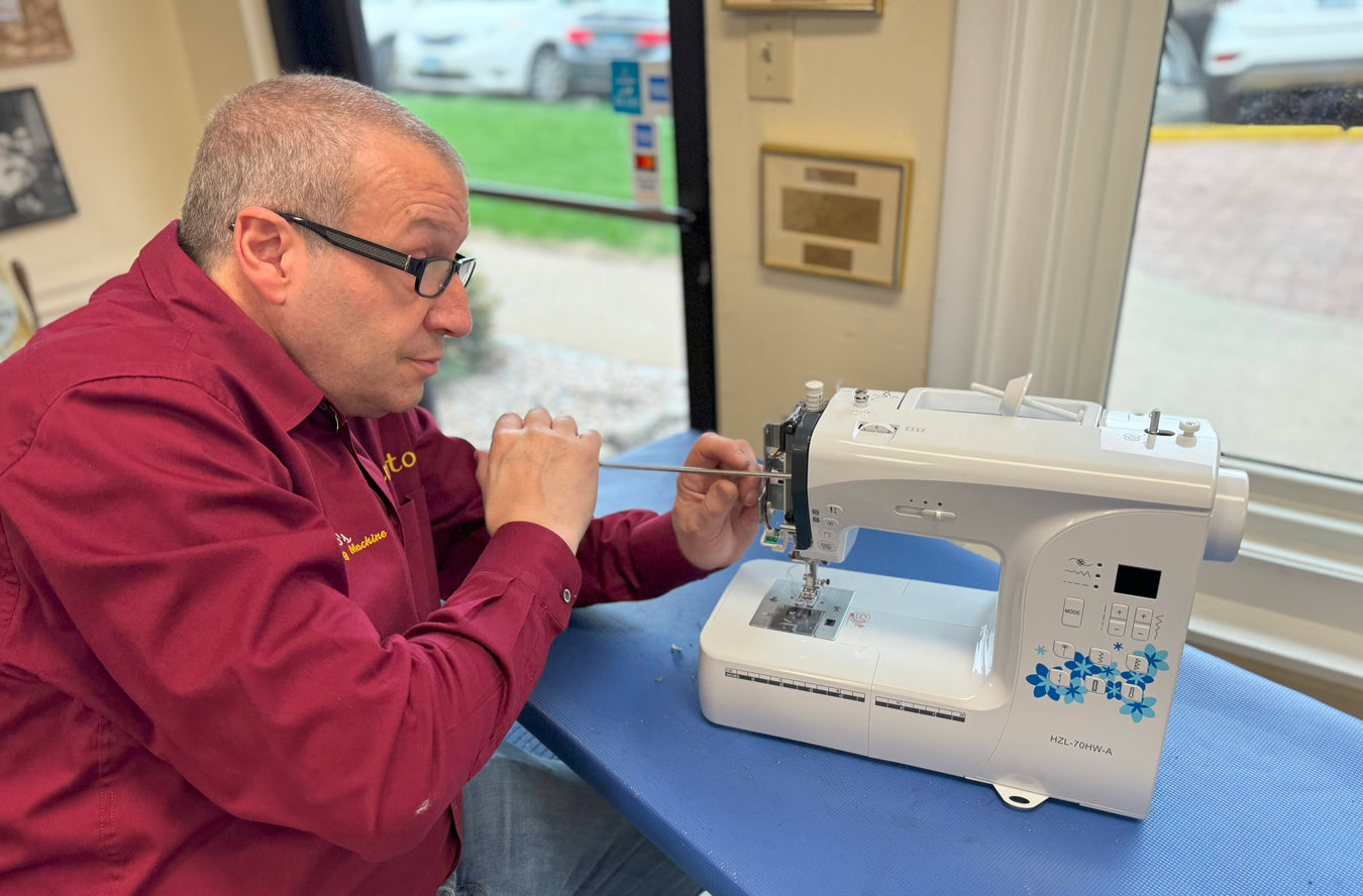 Renato servicing JUKI HZL-70HW-A screwdriver left side